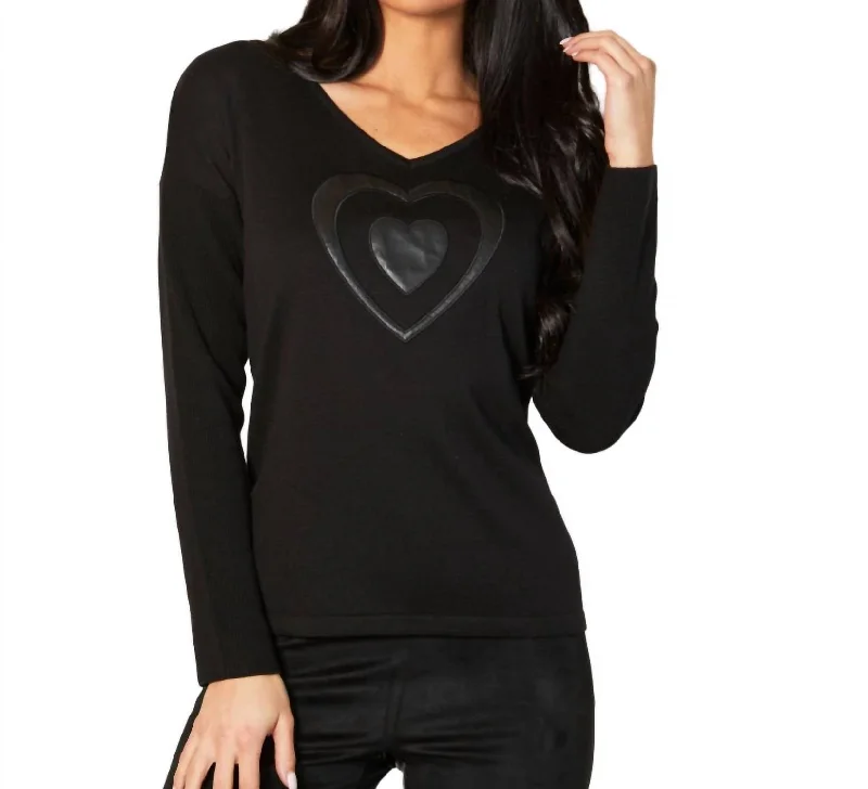 Elevate Your Wardrobe V-Neck Pleather Heart Detail Top In Black