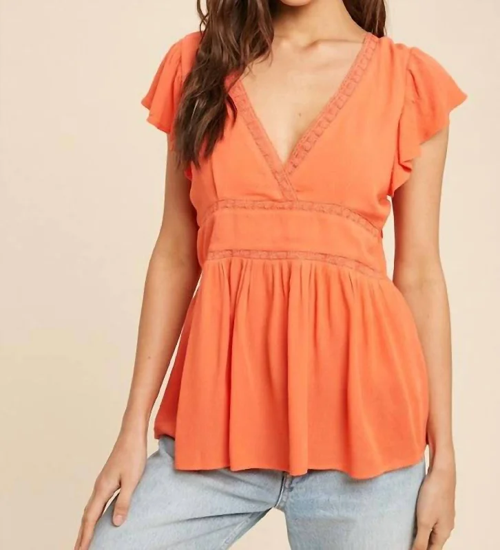 Step Ahead, Lead The Trend Holly Flutter Sleeve Tie-Back Top In Coral